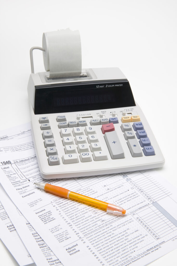Adding Machine Tax Forms And Pen 2427308 681x1024